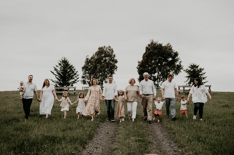farm kids; rustic tones family shoot; extended family portraits; grandkids; family farm walking portrait